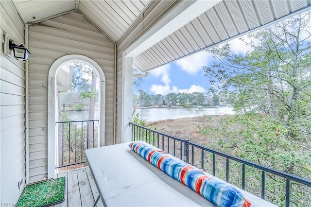 balcony featuring a water view