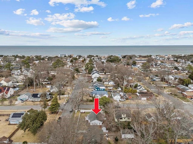 aerial view featuring a residential view and a water view