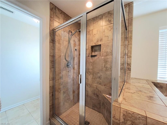 full bath with visible vents and a shower stall