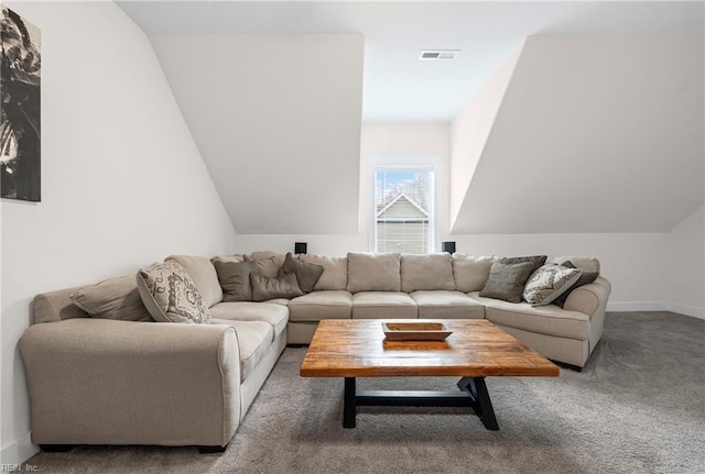 carpeted living room featuring lofted ceiling, baseboards, and visible vents