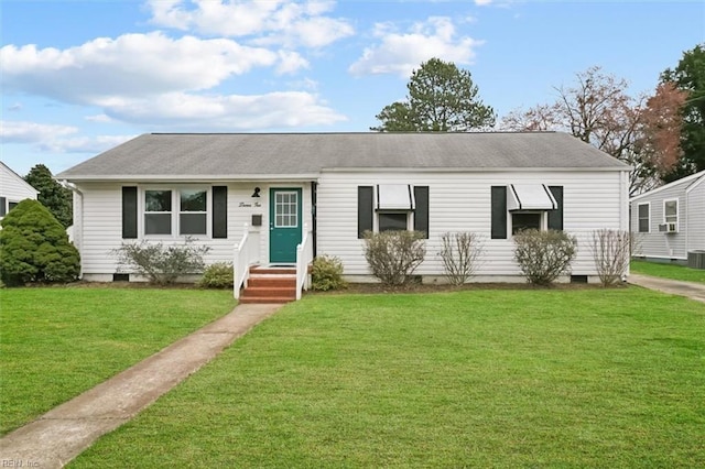 ranch-style home featuring crawl space, central air condition unit, and a front yard