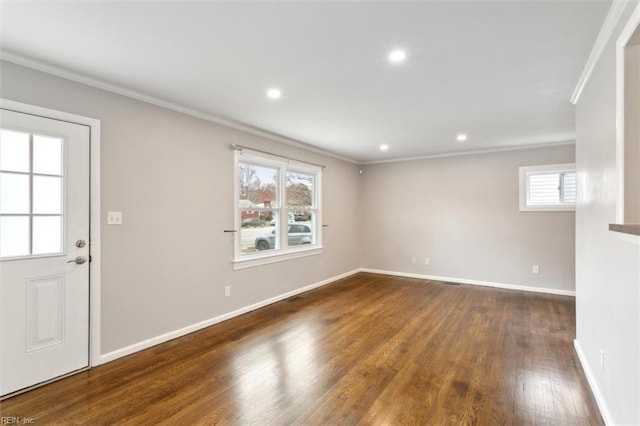 unfurnished living room with recessed lighting, baseboards, wood finished floors, and ornamental molding