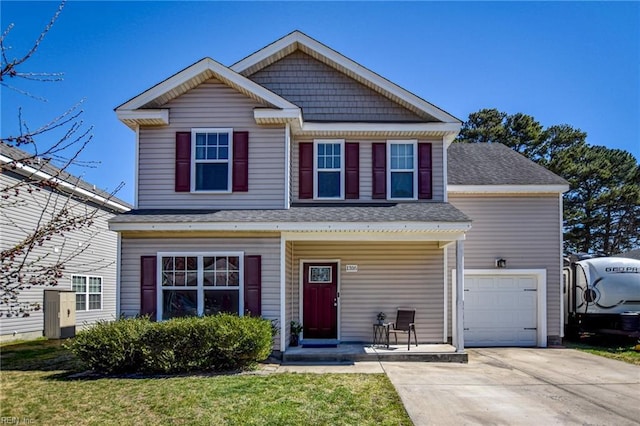 view of front facade featuring a front lawn, concrete driveway, roof with shingles, covered porch, and a garage