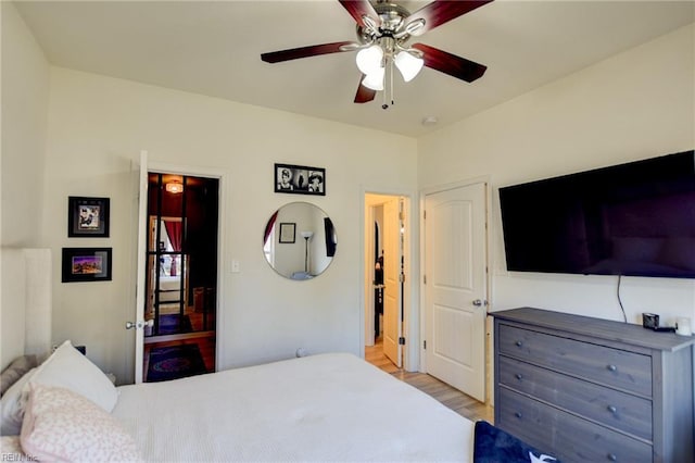 bedroom featuring ceiling fan and wood finished floors