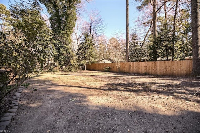 view of yard with fence