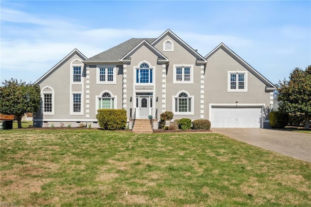 view of front of home with an attached garage, crawl space, stucco siding, a front yard, and driveway