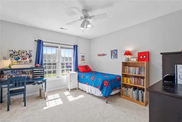 bedroom featuring baseboards, visible vents, ceiling fan, and carpet floors