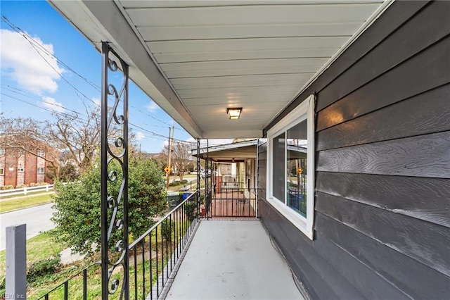 balcony featuring a porch