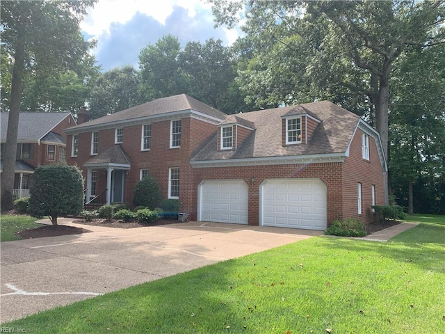 view of front of property with a front lawn, concrete driveway, a shingled roof, a garage, and brick siding