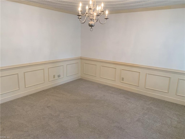 unfurnished room featuring a chandelier, light colored carpet, and ornamental molding