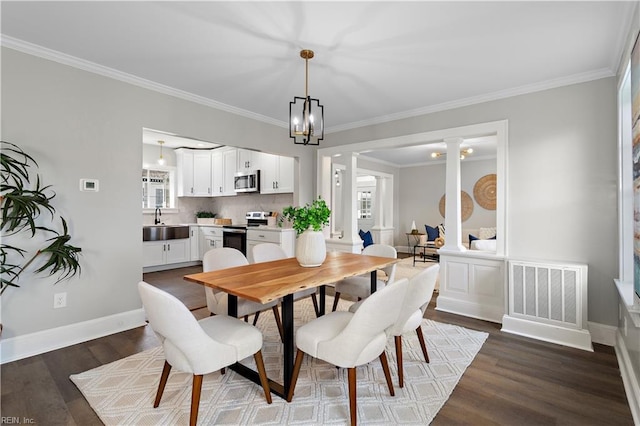 dining space with dark wood finished floors, decorative columns, baseboards, and visible vents