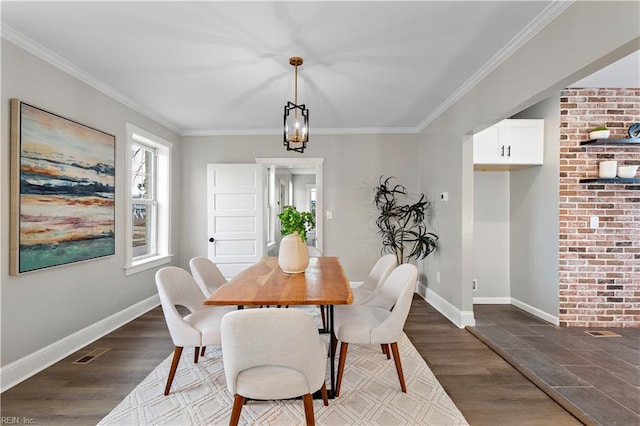 dining space with visible vents, baseboards, and dark wood-style floors