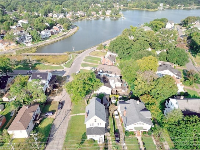 bird's eye view featuring a residential view and a water view