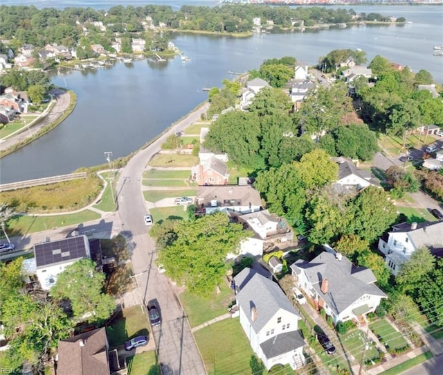 bird's eye view with a residential view and a water view