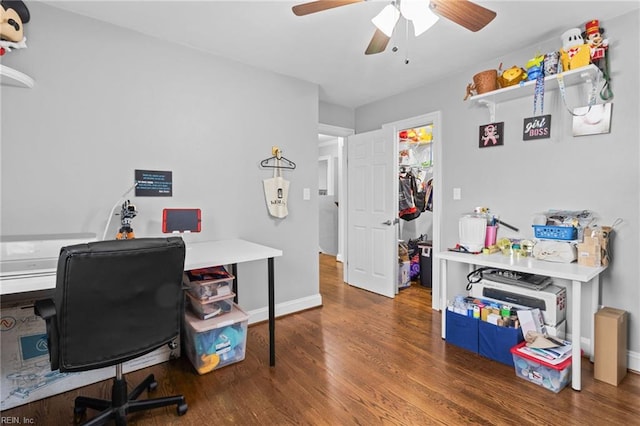 office featuring ceiling fan, baseboards, and wood finished floors