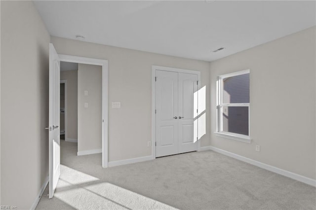 interior space featuring visible vents and baseboards