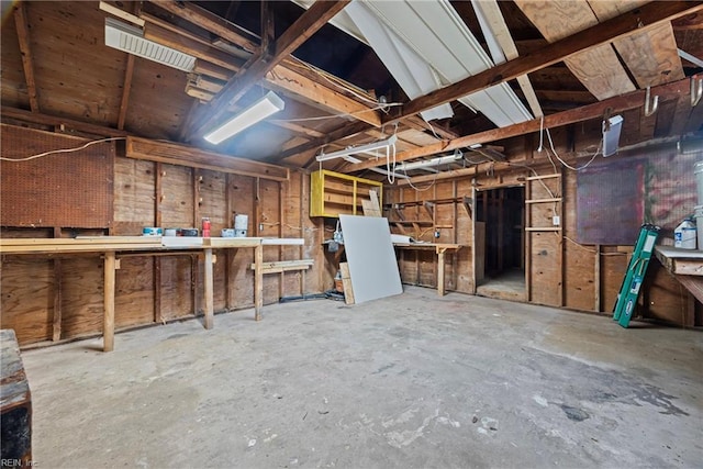 basement with a workshop area