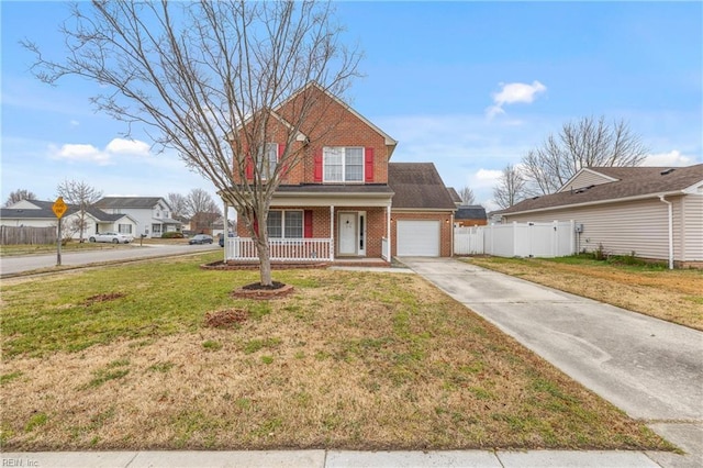 traditional-style house featuring brick siding, fence, concrete driveway, covered porch, and an attached garage