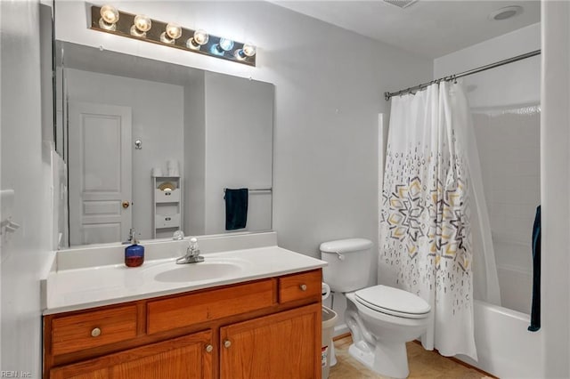 bathroom with shower / bath combo with shower curtain, toilet, and vanity