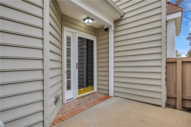 property entrance with fence