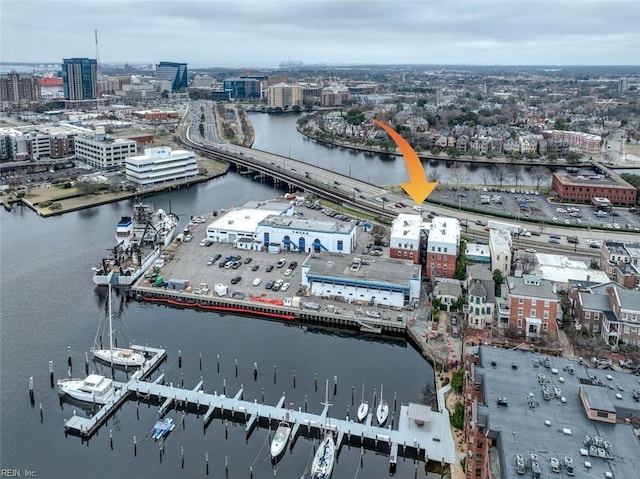 drone / aerial view with a water view and a city view