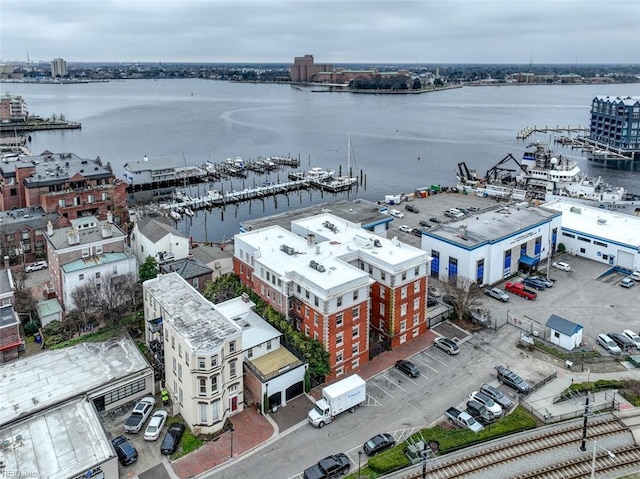 birds eye view of property featuring a water view