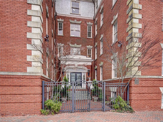 view of building exterior with fence