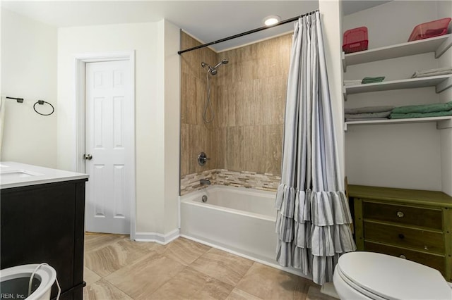 bathroom with vanity, toilet, baseboards, and shower / tub combo with curtain