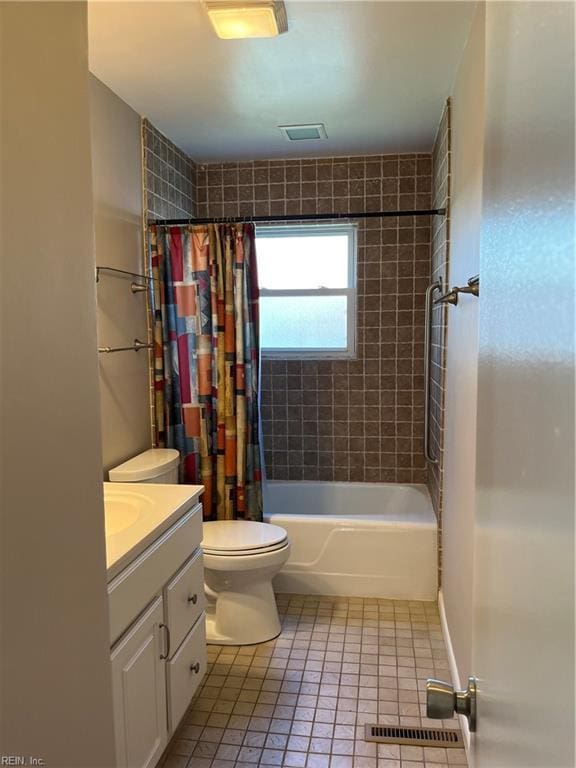 bathroom featuring visible vents, toilet, shower / bath combo, tile patterned floors, and vanity