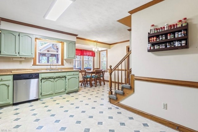 kitchen featuring crown molding, green cabinets, dishwasher, an inviting chandelier, and a sink