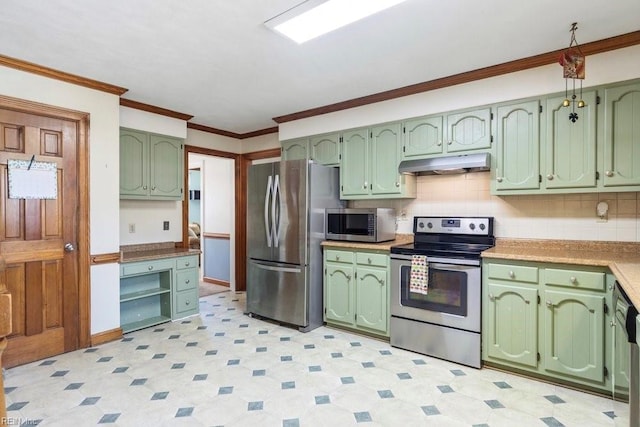 kitchen featuring green cabinets, ornamental molding, under cabinet range hood, and stainless steel appliances