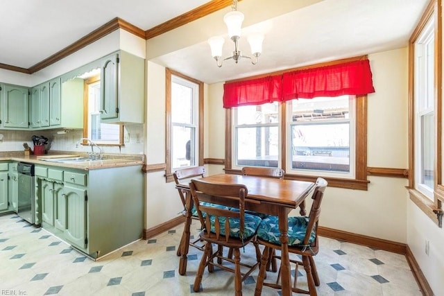 dining area featuring light floors, baseboards, an inviting chandelier, and ornamental molding