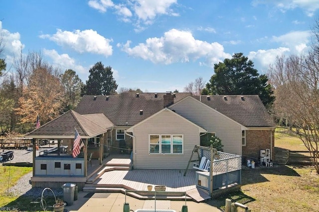 view of front of house featuring a wooden deck