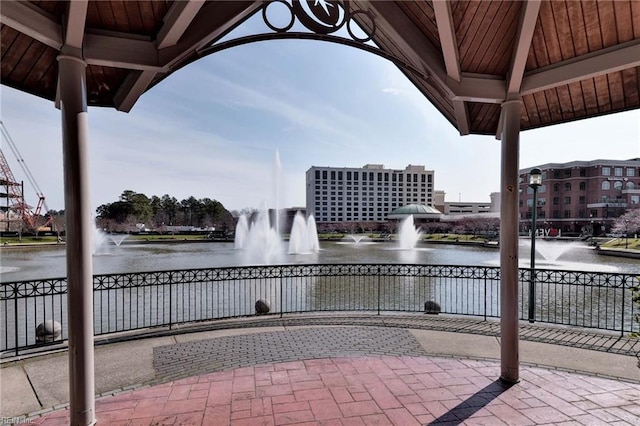 view of patio / terrace with a water view