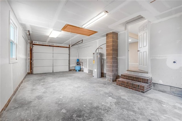 garage featuring electric water heater