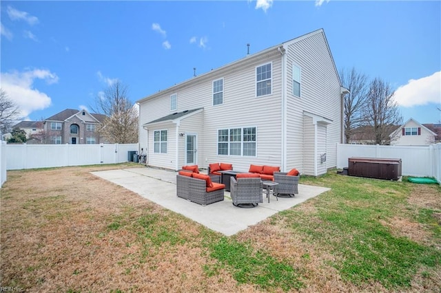 back of house featuring a patio area, an outdoor living space, and a fenced backyard