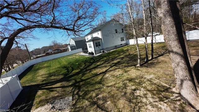 view of yard with a fenced backyard