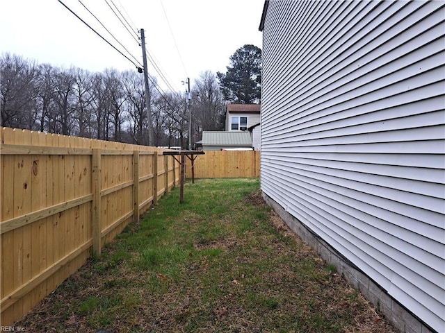 view of yard featuring a fenced backyard