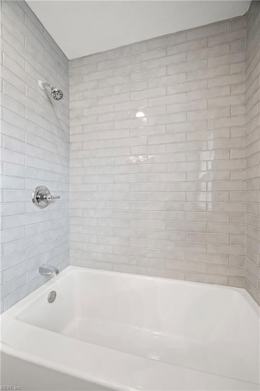 bathroom featuring bathing tub / shower combination