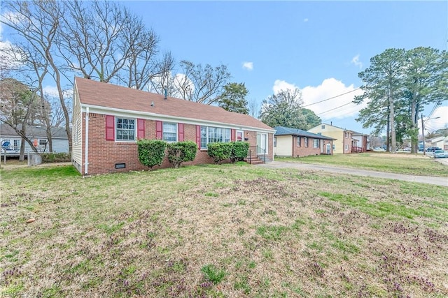 ranch-style house with crawl space, a front yard, and brick siding