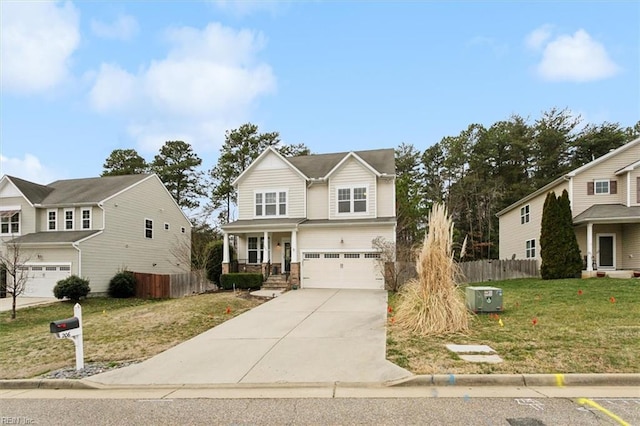 traditional home featuring driveway, a front yard, an attached garage, and fence