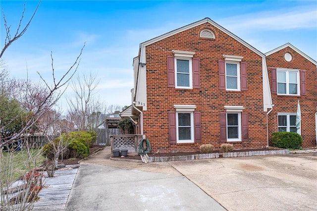 view of front of home with brick siding