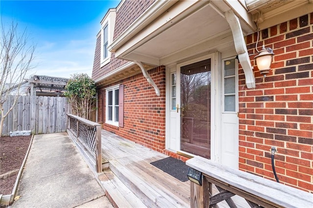 wooden deck featuring fence