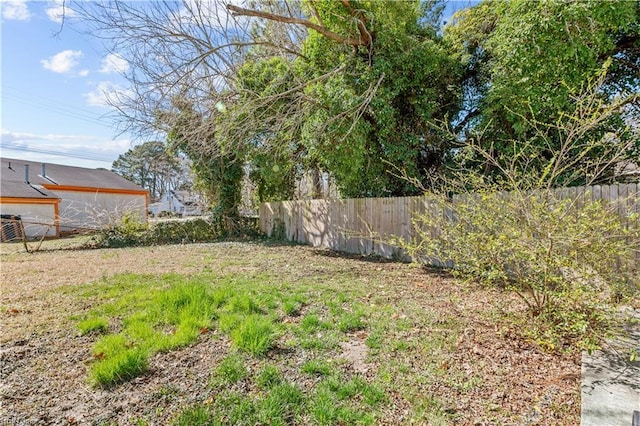 view of yard with fence