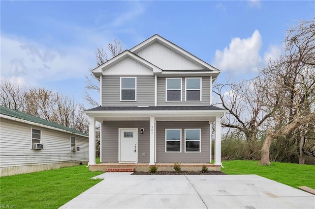 view of front of house with a porch, cooling unit, and a front yard