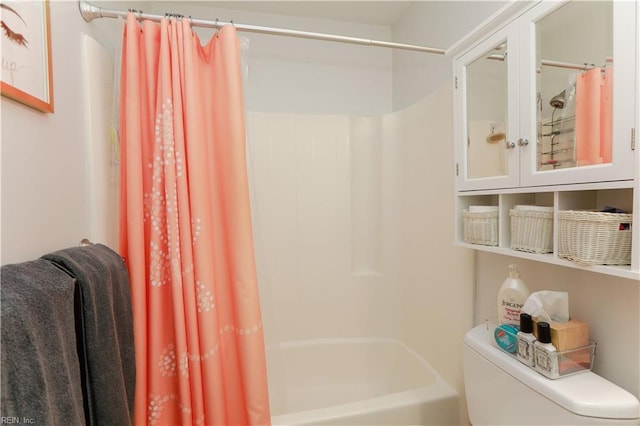 bathroom with toilet and shower / tub combo with curtain