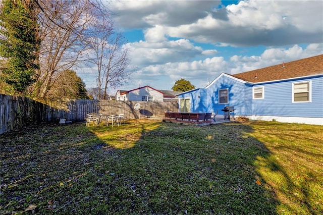 view of yard with a patio and a fenced backyard