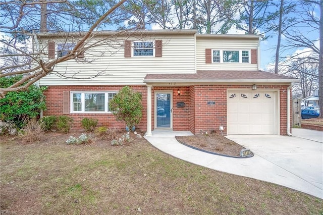 view of front of house featuring a garage, brick siding, and driveway