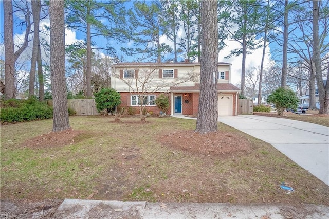 traditional-style house featuring brick siding, concrete driveway, a garage, and fence