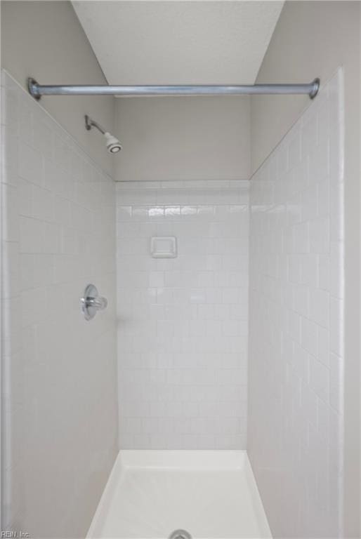 full bath featuring a stall shower